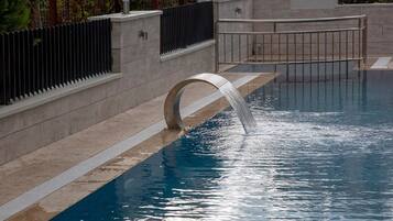 Outdoor pool, open 8:00 AM to 7:30 PM, pool loungers