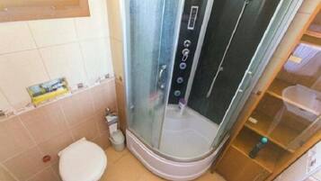 Villa | Bathroom | Separate bathtub and shower, towels