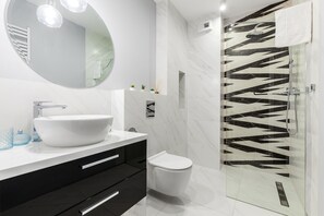 Design Apartment | Bathroom | Shower, rainfall showerhead, hair dryer, bidet