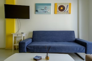 Maison Standard | Aire de séjour | Téléviseur à écran plat