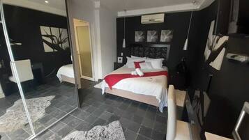 Deluxe Double Room (Self catering) | In-room safe, individually decorated, individually furnished, desk