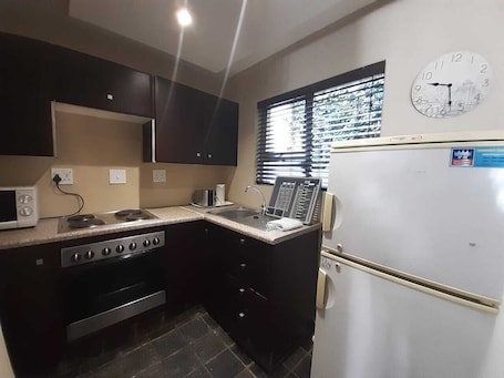 Deluxe Double Room (Self catering) | Private kitchen | Microwave, electric kettle