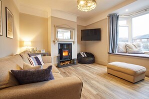 Three-Bedroom House | Living room | Flat-screen TV, fireplace