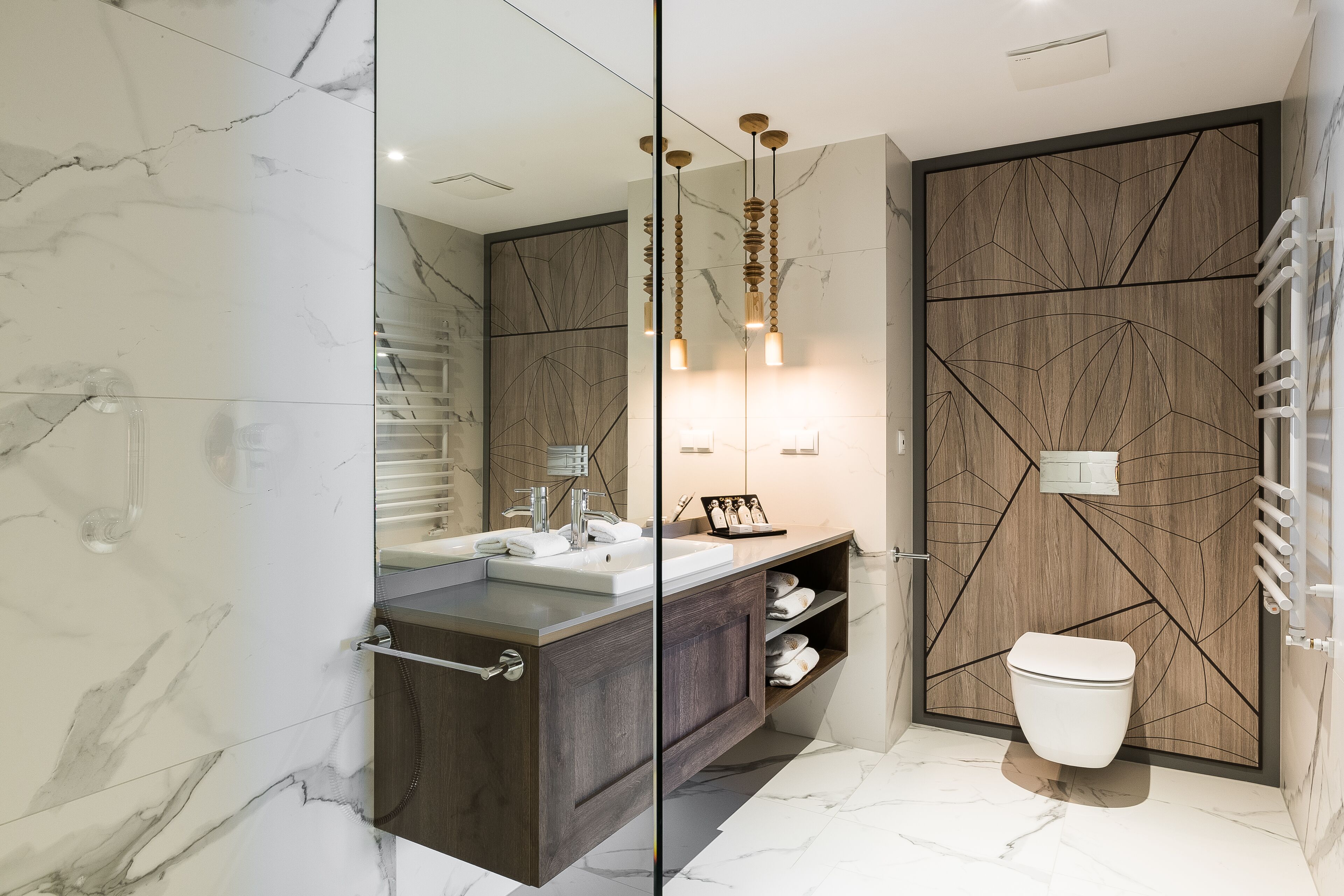 deluxe room | bathroom | hair dryer, bathrobes, slippers, towels