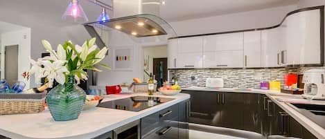 Exclusive Villa | Private kitchen | Full-size fridge, microwave, oven, stovetop