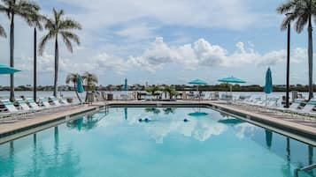A heated pool, sun loungers