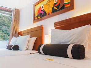 Habitación estándar con 2 camas individuales | Ropa de cama de alta calidad y minibar