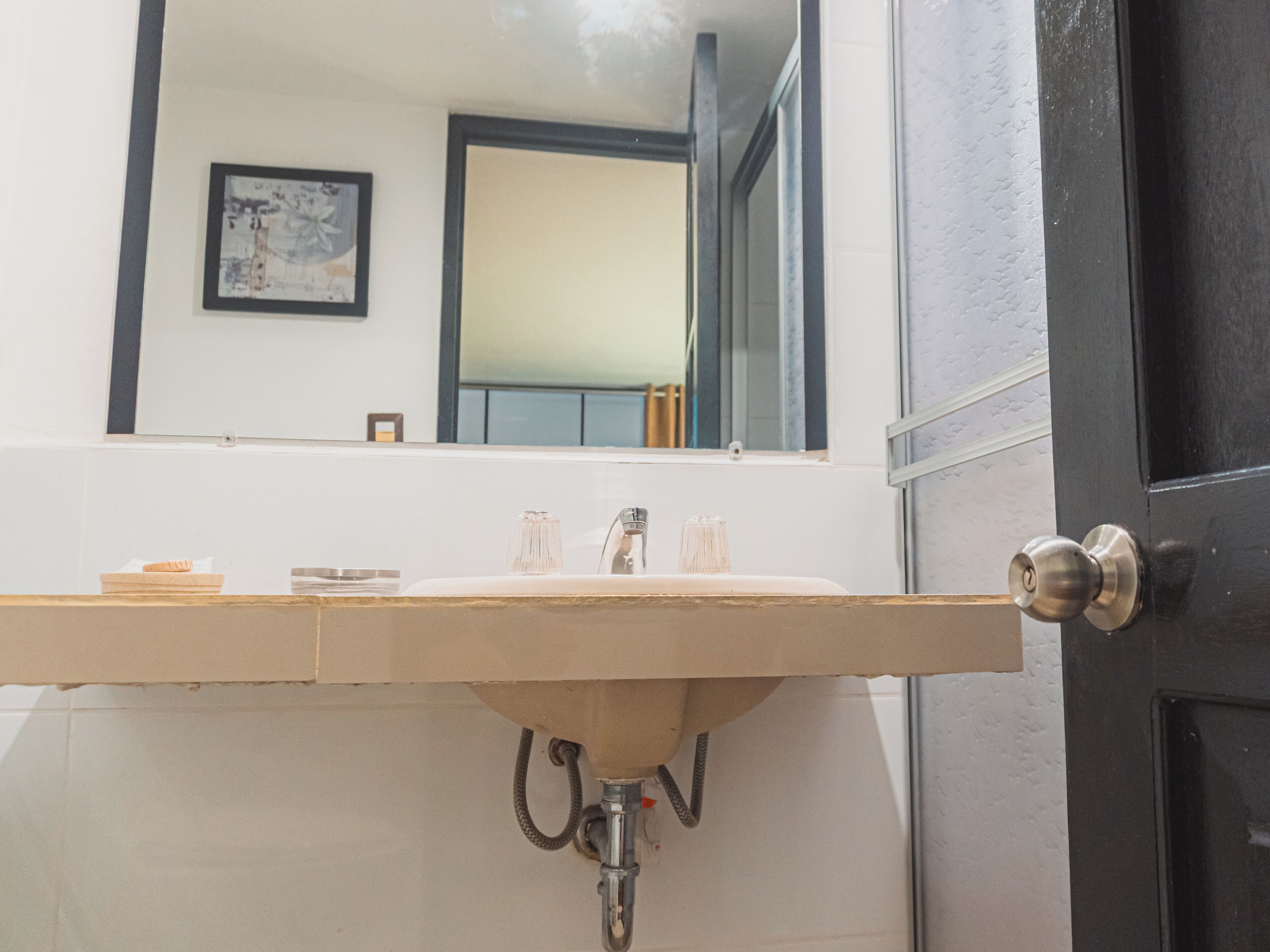 economy double room | bathroom | shower, hair dryer, towels, soap