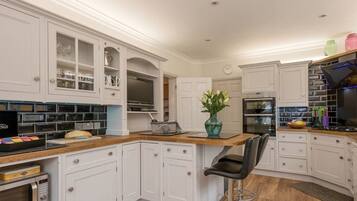 Luxury Villa | Private kitchen | Full-sized fridge, microwave, oven, stovetop