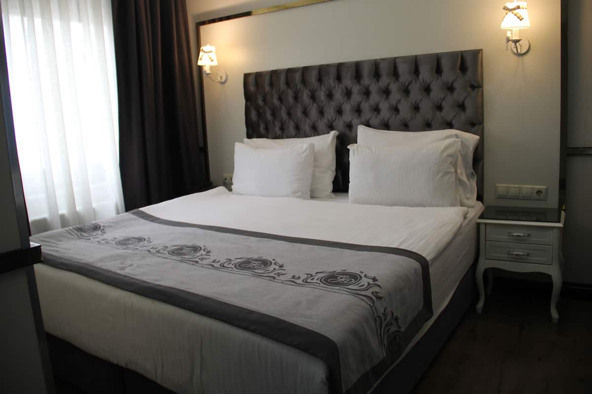 1 habitación, ropa de cama de alta calidad y minibar