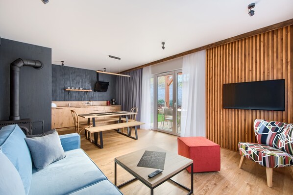 Appartement (F Delux) | Aire de séjour | Téléviseur à écran plat