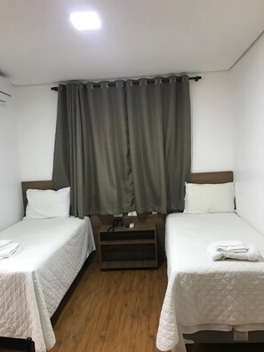 Habitación individual clásica | Minibar, escritorio y wifi gratis 
