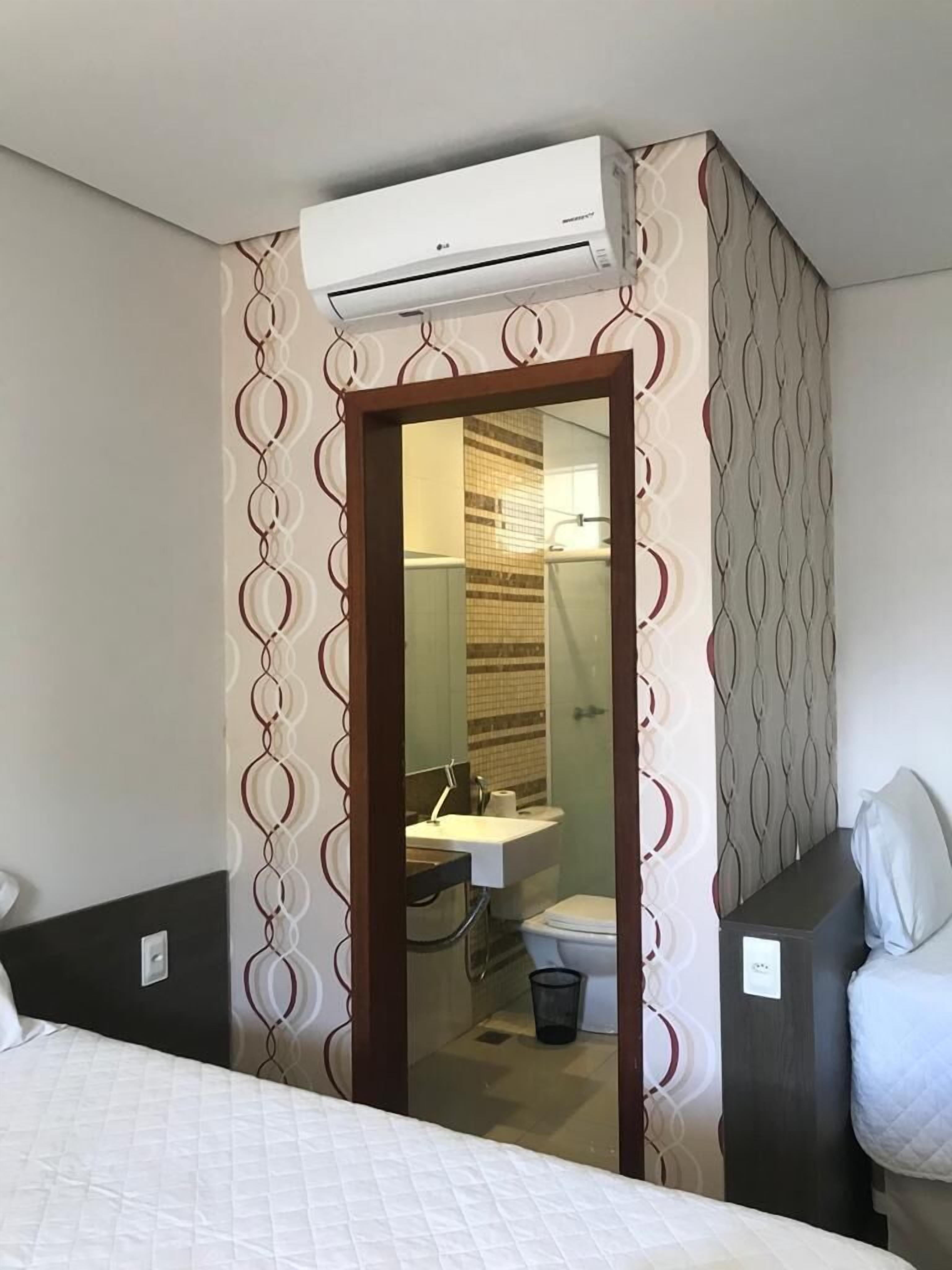 classic triple room | bathroom | shower, towels