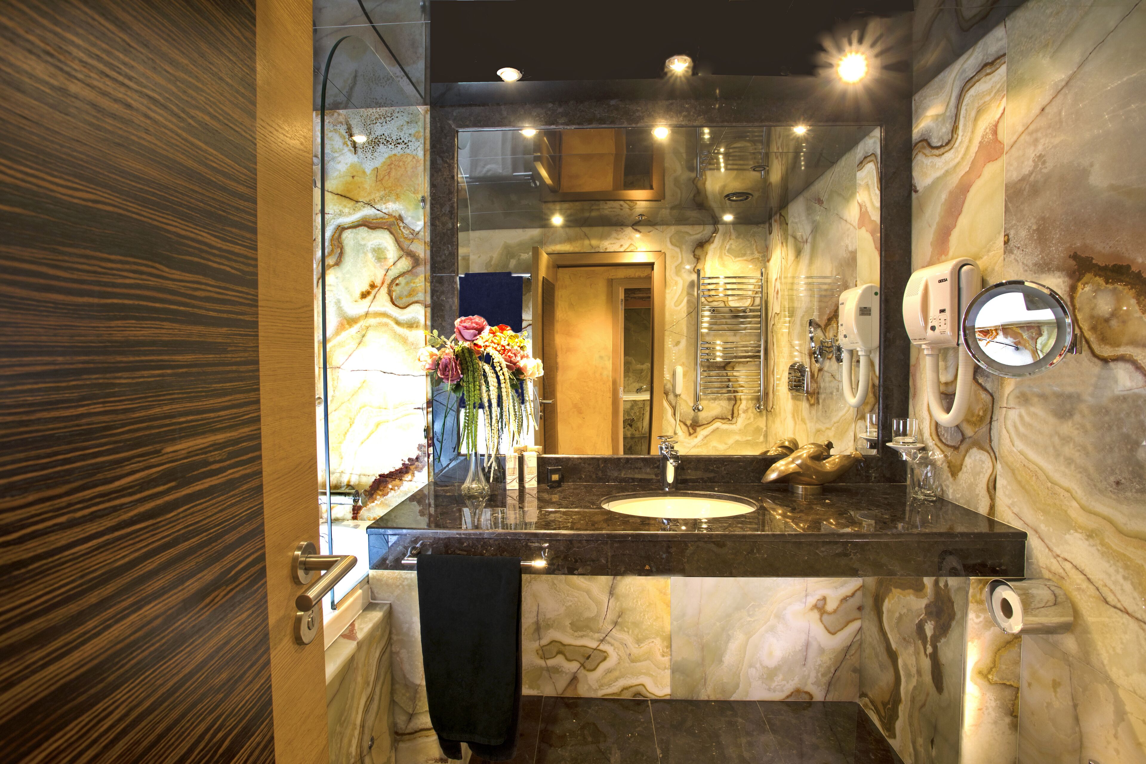 free toiletries, hair dryer, dressing gowns, slippers