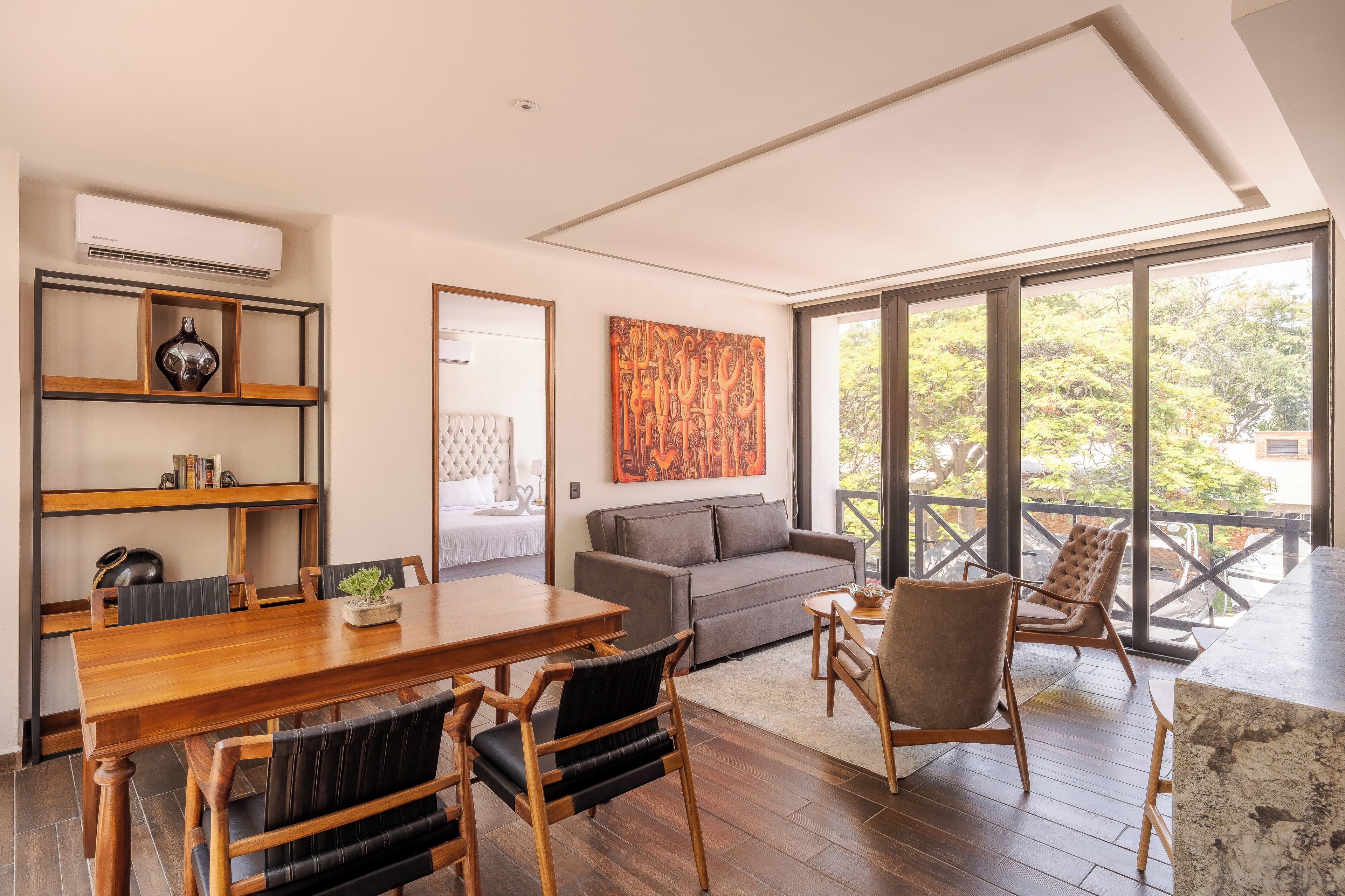 Luxury Studio Suite | Living area | 55-inch Smart TV with digital channels, Netflix, streaming services