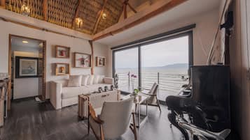 Luxury Cabin, Lake View | Living area | 55-inch Smart TV with digital channels, Netflix, streaming services