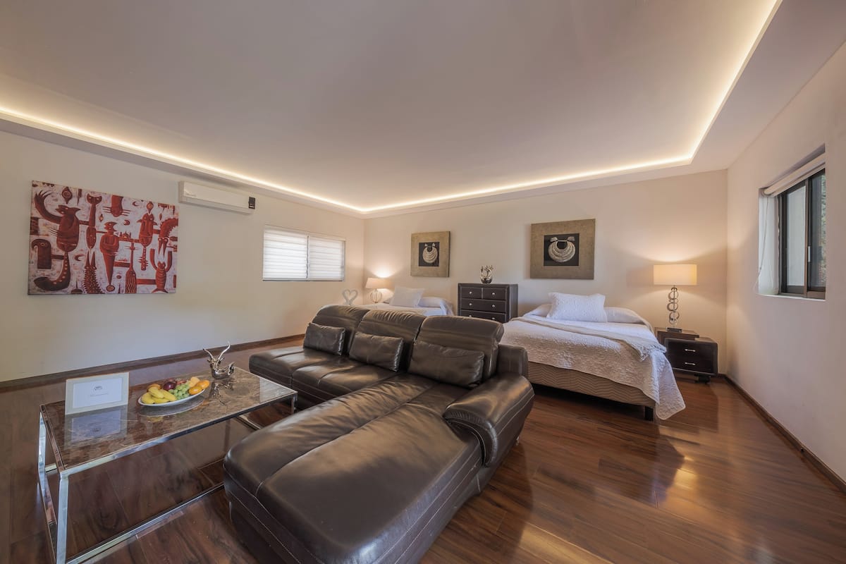 Comfort Quadruple Room, 2 Queen Beds, Air conditioning | In-room safe, blackout curtains, iron/ironing board, free WiFi