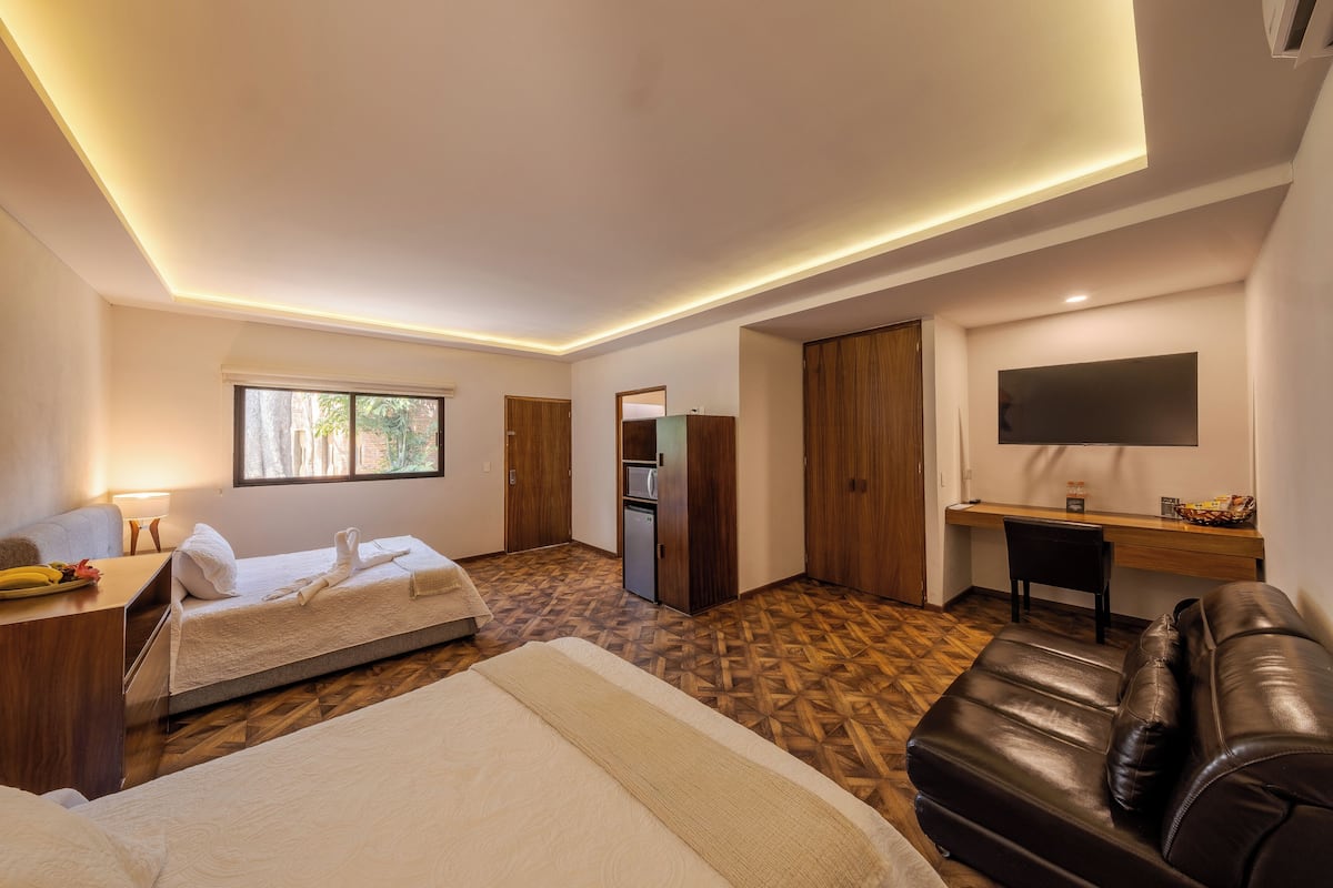 Habitación cuádruple estándar, 2 camas matrimoniales | 1 habitación, sábanas de algodón egipcio y ropa de cama de alta calidad