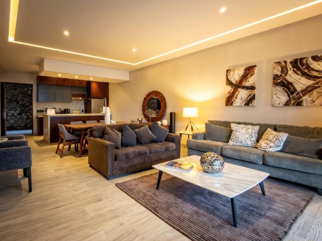 Deluxe Quadruple Room, 2 Bedrooms, Lake View | Living area
