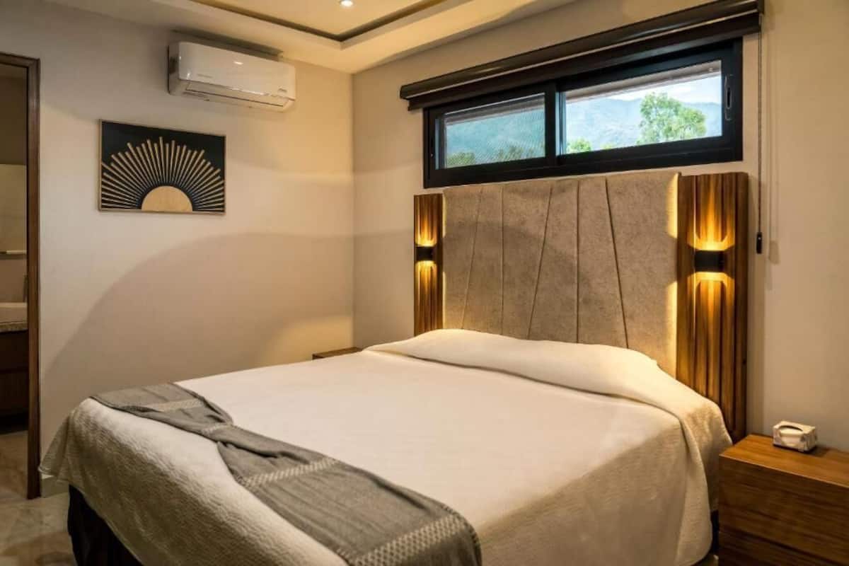 Deluxe Apartment, Lake View | In-room safe, blackout curtains, iron/ironing board, free WiFi