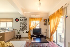 Standard Apartment | Living area | Flat-screen TV