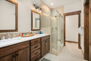Combined shower/tub, towels, soap, shampoo