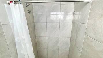 Standard Twin Room, 2 Double Beds | Bathroom | Shower, towels, soap, shampoo