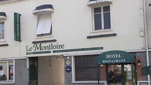 A building with a sign for "Le Montloire Hotel Restaurant" and a green sign indicating it is a hotel restaurant. - Hotel Le Montloire (Montlouis-sur-Loire)