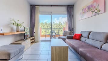 Basic Apartment | Living area | Flat-screen TV