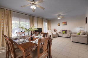 Standard Villa | Living area | Flat-screen TV