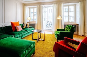 Historic 3-Bedroom Apartment with private Patio | Living area | 49-inch flat-screen TV with digital channels, TV - Luxury Residences by Widder Hotel (Zürich)