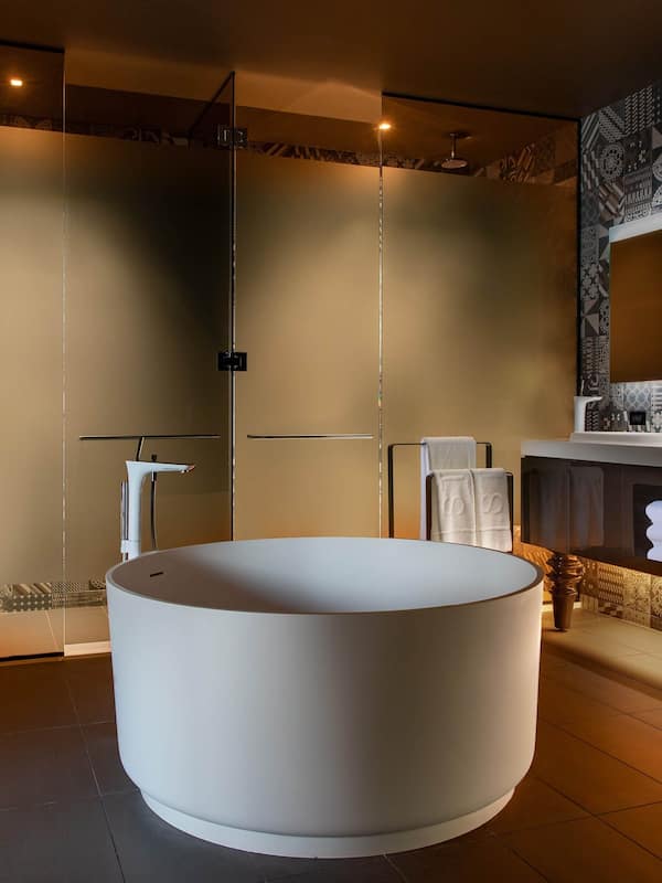 Designer toiletries, hair dryer, bathrobes, towels