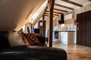 Apartment, 1 Bedroom (5) | Living area | 32-inch flat-screen TV with digital channels, TV, toys