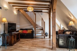 Apartment, 1 Bedroom (5) | Living area | 32-inch flat-screen TV with digital channels, TV, toys