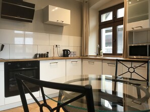 Suite estudio (3) | Cocina privada | Frigorífico, microondas, horno y placa de cocina