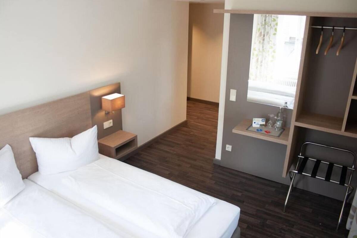 desk, blackout curtains, free wifi, bed sheets