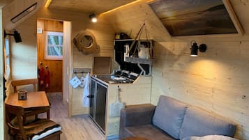 House, 1 Bedroom | Living area | Flat-screen TV
