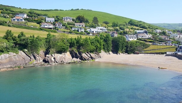 A coastal village with houses on a hillside overlooking a calm bay. - 3 Bed in Parracombe (oc-molec) (Parracombe)