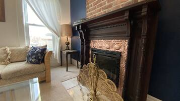 Smart TV, fireplace, books