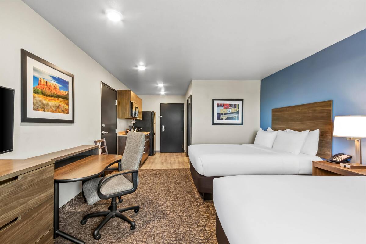 Premium bedding, pillowtop beds, desk, laptop workspace