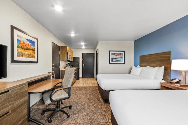 Premium bedding, pillowtop beds, desk, laptop workspace