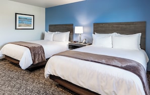Premium bedding, pillowtop beds, desk, laptop workspace