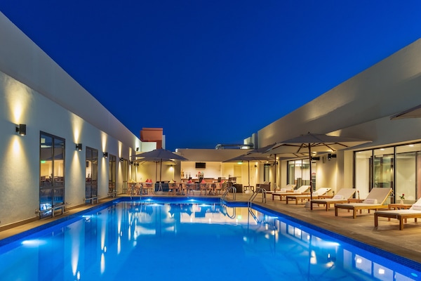 Outdoor pool, open 8:00 AM to 8:00 PM, sun loungers