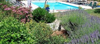 Old stone farmhouse in a quiet location with large heated pool.