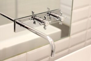 Bathtub, hair dryer, towels, soap