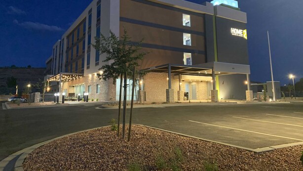 A multi-story hotel with a modern design, featuring a prominent 'Home 2' sign on the facade. - Home2 Suites by Hilton Page Lake Powell (Page)