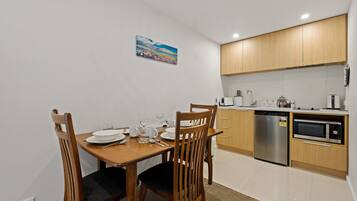 Fridge, microwave, toaster, cookware/dishes/utensils