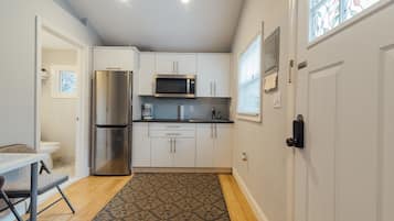 Fridge, microwave, coffee/tea maker, electric kettle