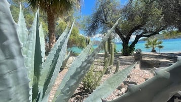 On the beach, sun-loungers, beach towels