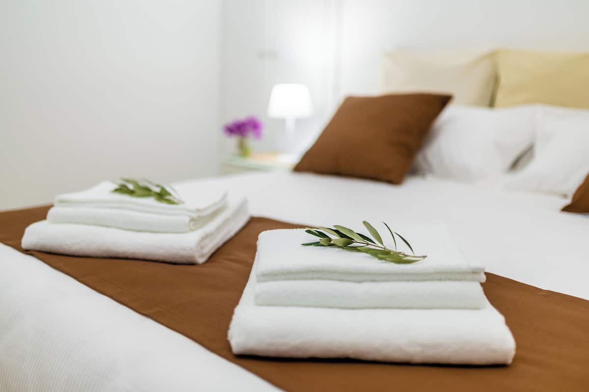 1 bedroom, down comforters, memory foam beds, blackout drapes